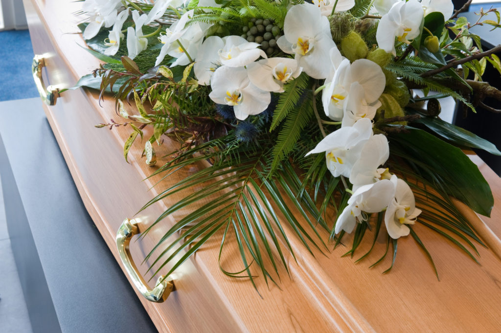 Coffin with flowers